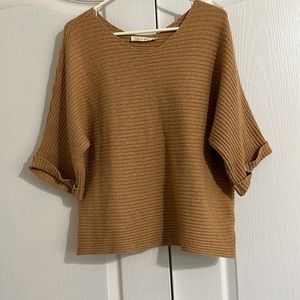 Ribbed Camel Sweater with scoop neck and 3/4 cuffed sleeve.